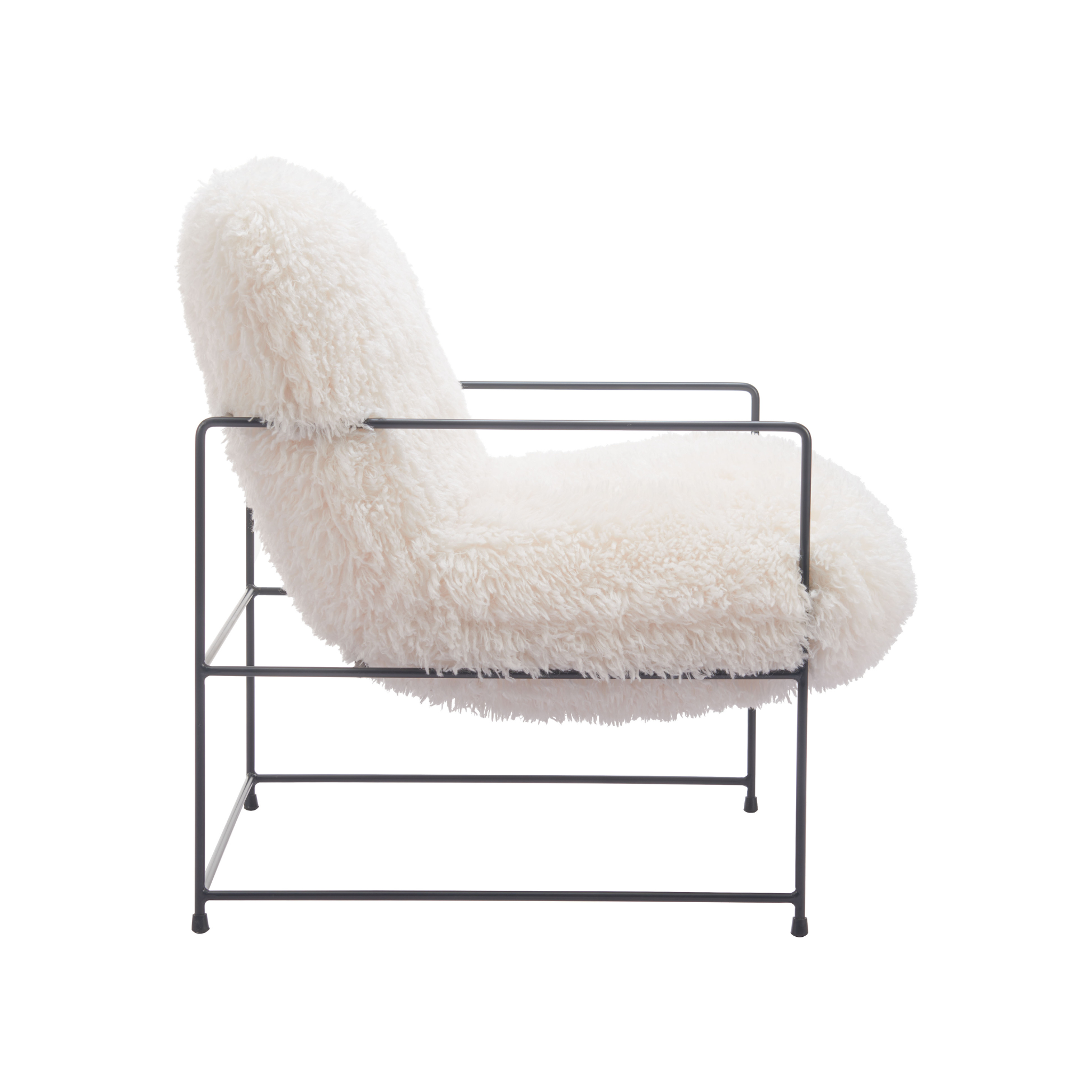 Vista lateral del Sillón Soma mostrando su diseño minimalista y textura suave