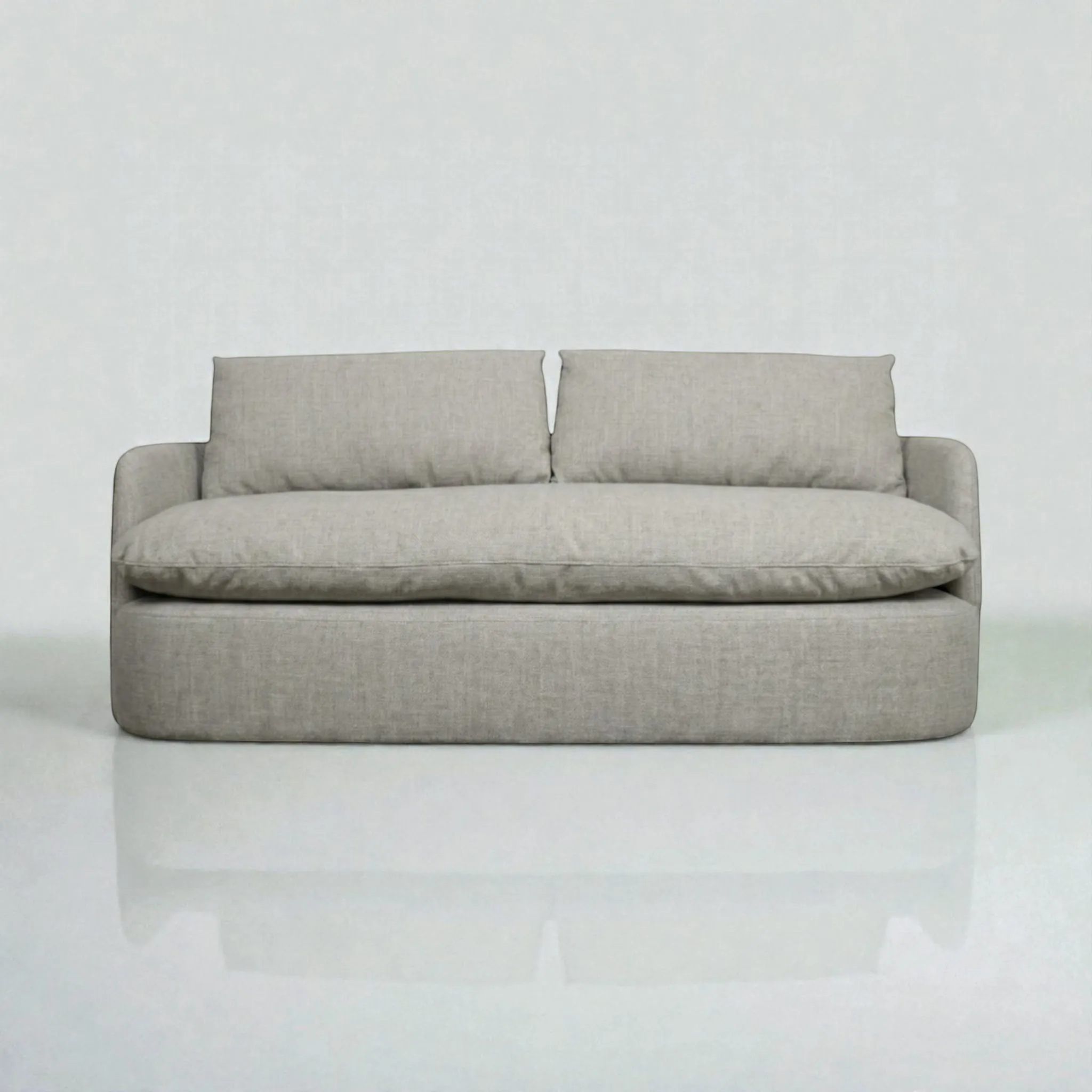 SWANK Muebles + Decor Sofá Sereno light grey linen blend sofa with curved low profile and plush cushions.